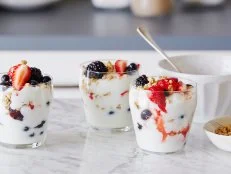 YOGURT AND FRUIT PARFAITS, Rachael Ray, 30 Minute Meals/Breakfast for Dinner, Food
Network, Vanilla Nonfat Yogurt, Frozen Strawberries, Blackberries, Raspberries, Blueberries,
Granola