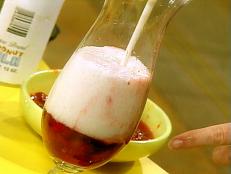 These can be made as mocktails for the kids or cocktails for big kids. The recipe calls for defrosted frozen sliced strawberries. When you bring them home from the market, place them on a dish in the refrigerator so they will be soft and ready to process. The dish will catch any leaks or moisture from defrosting.