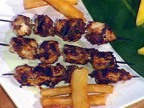 Bob Marley's Reggae: Jerk Marinated Chicken Breast Skewers, Chargrilled and Served with Creamy Cucumber Dipping Sauce and Yucca Fries