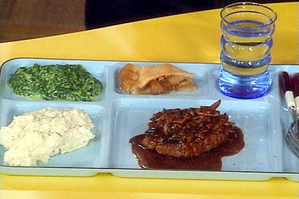 Salisbury Steak with Wild Mushroom Gravy, Smashed Potatoes with garlic and Herb Cheese and Chives, Creamed Spinach image