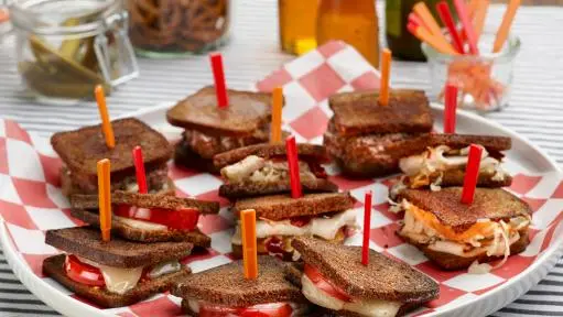 https://food.fnr.sndimg.com/content/dam/images/food/fullset/2004/1/26/0/tm1d36_mini_sandwich_buffet.jpg.rend.hgtvcom.511.288.suffix/1431773810053.webp