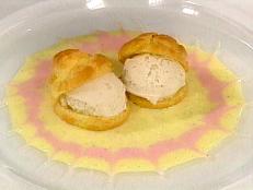 This sauce is based on a classic vanilla anglaise, a sauce thickened with egg yolks and served cold over berries, chocolate cake or with a hot fruit pie. It was invented by the French but called anglaise (or "English" in French) because they observed the English always pouring a light colored cream liquid on their desserts. That liquid was what the British call "pouring cream," and it's a very thick flavorful cold cream they serve with dessert in a pitcher and pour it over everything.
