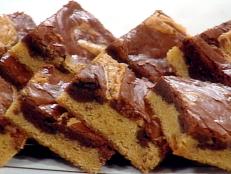 Rich, moist, delicious. This was a recipe my mom always made. She used a lot more flour and less sugar. My kids love when I bake, and I took this recipe and played around with it, changing it to be chewy and not cake-like. They also liked the vanilla and chocolate mix. She would use unsweetened chocolate but my boys prefer this combo. After weeks of changing the recipe, this is what we came up with to being their favorite.