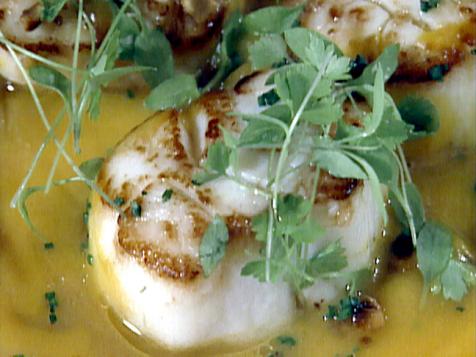 Seared Scallops with Pumpkin Broth and Roasted Hazelnuts