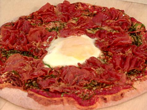 Pizza with Prosciutto, Spinach, Truffle Oil, and Egg