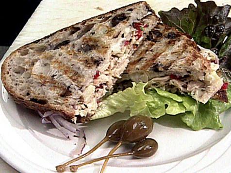 Tuna and Artichoke Salad on Kalamata Olive Bread with Provolone Cheese and Fresh Herb and Garlic Aioli