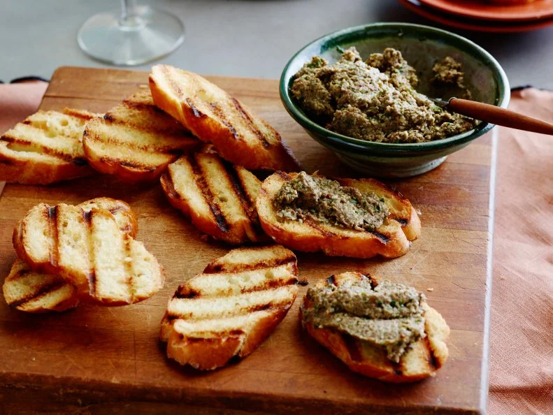 MUSHROOM PESTO CROSTINIGiada De LaurentiisCooking ChannelDried Porcini Mushrooms, White Button Mushrooms, Walnuts, Cloves, Italian Parsley, Olive Oil,Parmesan, Baguette