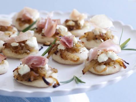 Pizzettes with Caramelized Onions, Goat Cheese, and Prosciutto