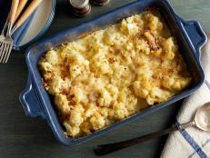 Prep Ina Garten's recipe for Cauliflower Gratin from Barefoot Contessa on Food Network ahead as a creamy, cheesy vegetable side for a no-stress dinner party.