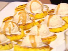Start your grilling season with this slimming Ellie Krieger dessert. Pineapples are the only known source of bromelain, an enzyme that may help reduce inflammation.  With 154 calories and 5 grams of fat per pineapple ring, it’s a perfect dessert for a hot day (especially with bathing suit season around the corner).