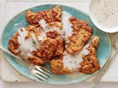 For a classic, down-home supper, try Alton Brown's Chicken-Fried Steak recipe smothered in gravy, from Good Eats on Food Network.