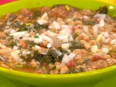 This soup is a staple in Tuscany, my favorite place to eat because the food goes back so many generations and remains so simple and not-fussed-with. null This bread soup has some vegetable in it, but it is made with beef stock. For a vegetarian version, use all vegetable or wild mushroom stock and skip the pancetta or bacon.