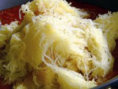 Dress up tender strands of squash with homemade tomato sauce with this low-carb recipe for Spaghetti Squash with Marinara from Food Network.