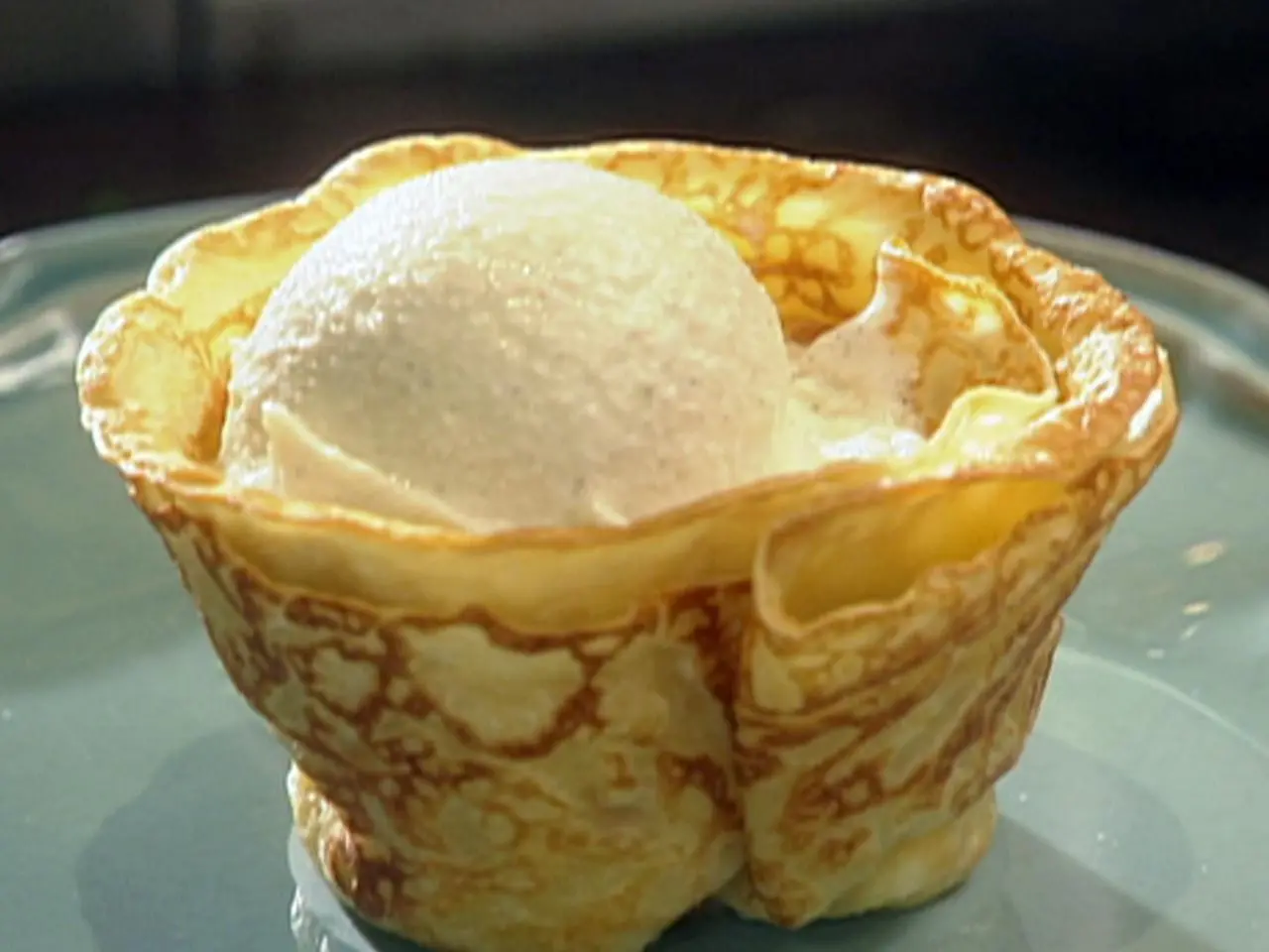 Crepes Suzette with Vanilla Ice Cream and Orange Butter Sauce