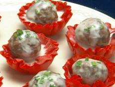 These cocktail-sized meatball appetizers are created from venison (deer-meat), a low calorie and very low fat meat. This recipe combines light and flaky phyllo filled with mildly-flavored meat and topped with tangy mango chutney. Instead of the recommended 2 per person portion, create larger meatballs and to serve over whole wheat spaghetti.