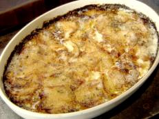 Try Tyler Florence's super-cheesy and creamy potatoes gratin from Food Network.