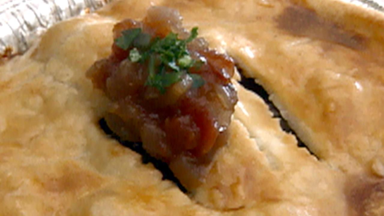 https://food.fnr.sndimg.com/content/dam/images/food/fullset/2007/4/27/0/ie0113_meatpie.jpg.rend.hgtvcom.1280.720.suffix/1371585576722.jpeg