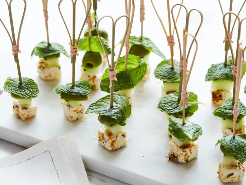 Ellie Krieger’s Marinated Feta and Olive Skewers.