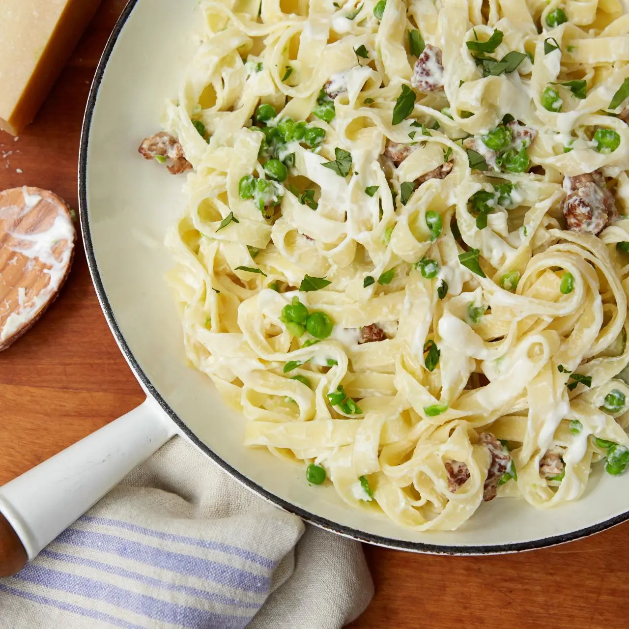 Tagliatelle with Smashed Peas, Sausage, and Ricotta Cheese