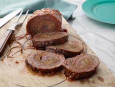 For an Italian favorite, make Giada De Laurentiis' elegant Braciole, rolled-up flank steak basted with tomato sauce, from Everyday Italian on Food Network.