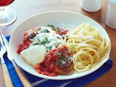 For classic Italian comfort tonight, try Tyler Florence's Chicken Parmesan recipe from Food Network.
