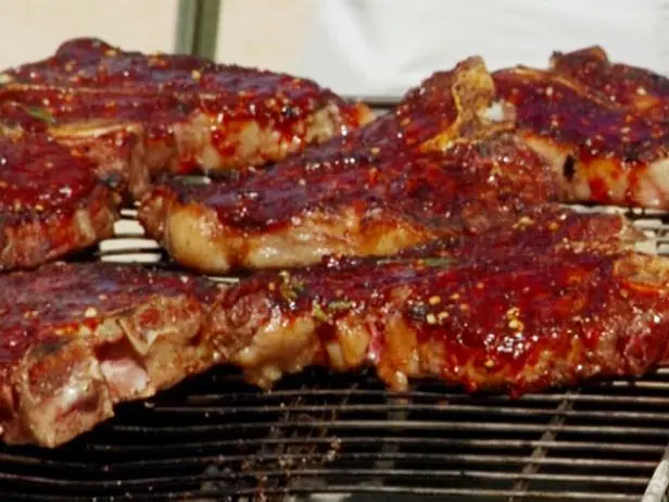 Porterhouse Steak with Fra Diavolo BBQ Sauce and Cherry Peppers in Vinaigrette