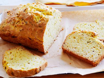 NEELY’S QUICK BREAD, Patrick and Gina Neely, Down Home with The Neely’s/Feel Good
Food, Food Network, Vegetable Oil, All-­purpose Flour, Ground Mustard, Salt, Baking Soda,
Baking Powder, Cayenne, Egg, Light Beer, Smoked Gouda, Thyme