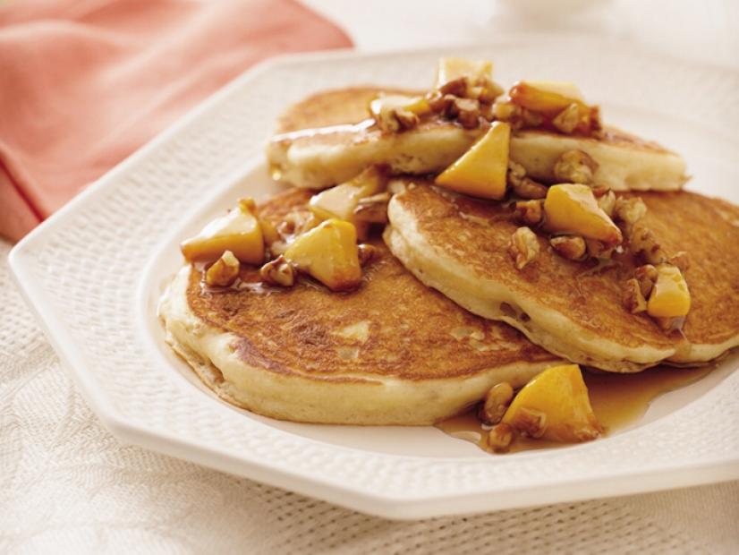 This recipe image is sponsored by Bisquick. Bisquick Praline Peach Pancakes. 