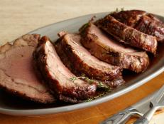 Bobby Flay's Roast Prime Rib with Thyme au Jus recipe, from Boy Meets Grill on Food Network, makes for an impressive holiday main course.