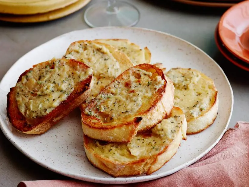 ROASTED GARLIC BREADMichael ChiarelloCooking ChannelGarlic, Olive Oil, Thyme, Unsalted Butter, Crusty Bread Loaf