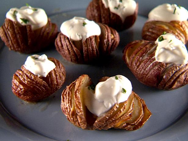 Garlic Hasselback Potatoes with Herbed Sour Cream image