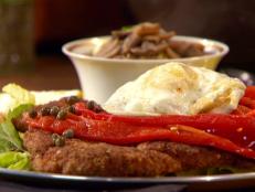 This past holiday season I visited Vienna for the first time with my mom, brother and husband. We all had our fill of schnitzel. Back home, I combined elements from a few versions and a twist or 2 of my own. This dish can be made with veal, chicken or pork cutlets.