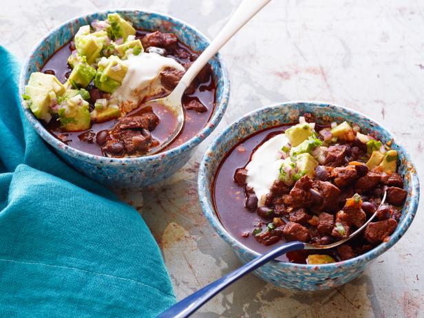 Beef And Black Bean Chili With Toasted Cumin Crema And Avocado Relish Recipe Bobby Flay Food Network