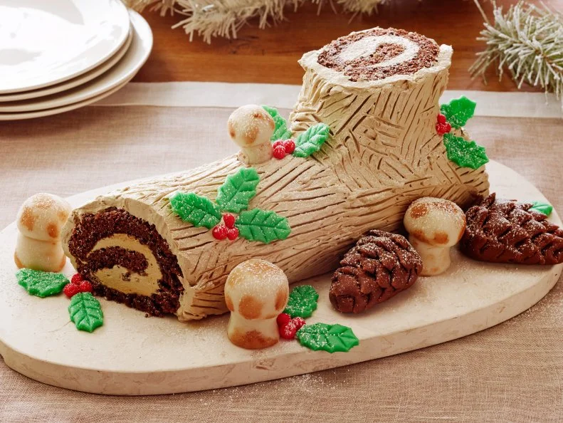 BUCHE DE NOEL
Food Network
Eggs, Sugar, Unsalted Butter, Instant Espresso, Rum, Chocolate Genoise Sheet, Almond Paste,
Confectionersâ Sugar, Light Corn Syrup, Egg Yolks, Salt, Cake Flour, Cornstarch, Alkalized
Cocoa