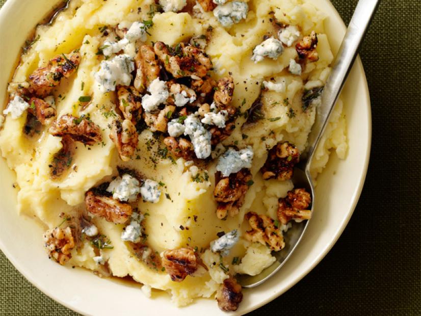 A Cream Dish of Whipped Potatoes Sprinkled with Walnuts, Blue Cheese and Herbs
