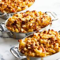 Description: Ina Garten's Lobster Mac and Cheese. Keywords: Cavatappi, Elbow Macaroni, Milk, Gruyere Cheese, Cheddar, Nutmeg, Lobster, White Bread.