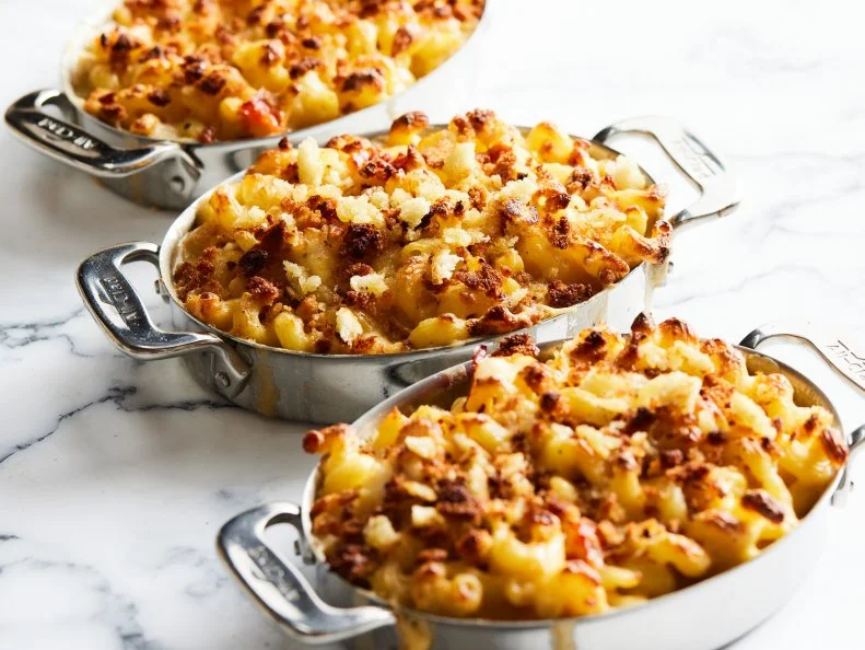 Description: Ina Garten's Lobster Mac and Cheese. Keywords: Cavatappi, Elbow Macaroni, Milk, Gruyere Cheese, Cheddar, Nutmeg, Lobster, White Bread.