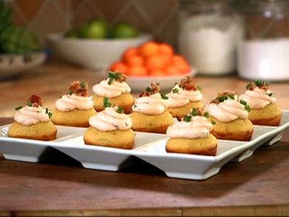 Bacon Corn Muffins Topped With Savory Cream Cheese Frosting, Bits of Bacon and Chives in a Compartmental Tray