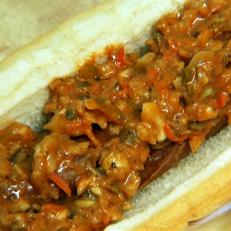 Sweet and Spicy Onion Relish on a Hot Dog and Bun