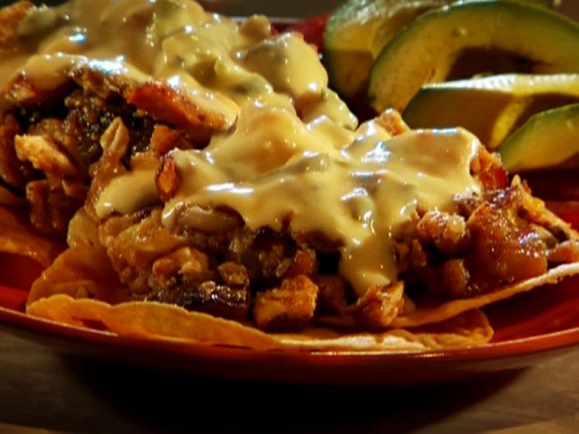 Texas Chicken Hash Smothered With Cheese on Corn Tortillas