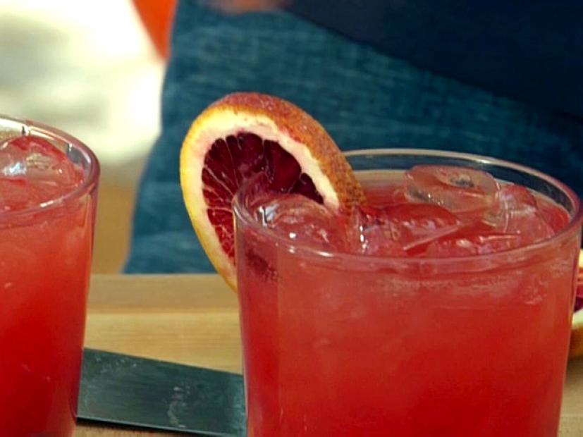 Two Glasses of Campari and Blood Orange Cocktail Garnished 
With a Blood Orange Slice