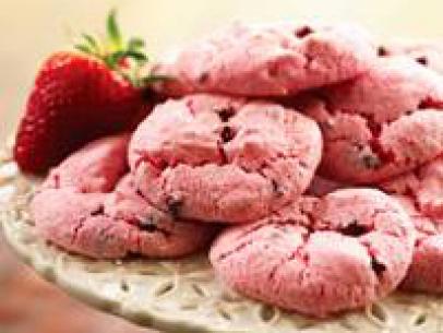 Strawberry Angel Cookies on a decorative dessert pedestal