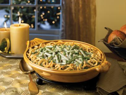 Green Bean Casserole in a Golden Baking Dish on a holiday themed table
