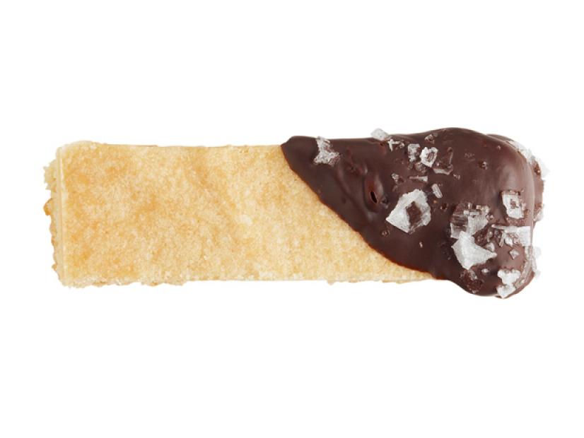 A Shortbread cookie dipped in chocolate against a white background