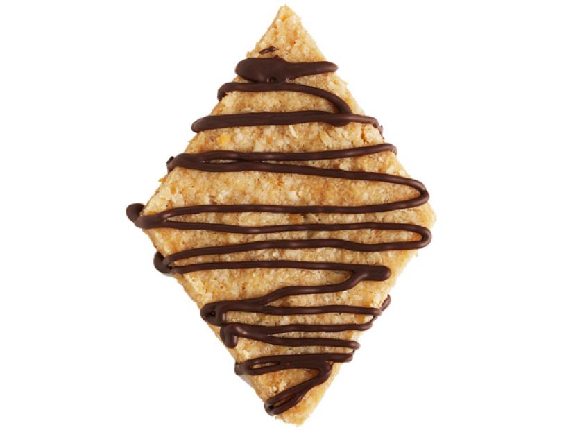 Old Walnut Thins drizzled with chocolate placed against a white background