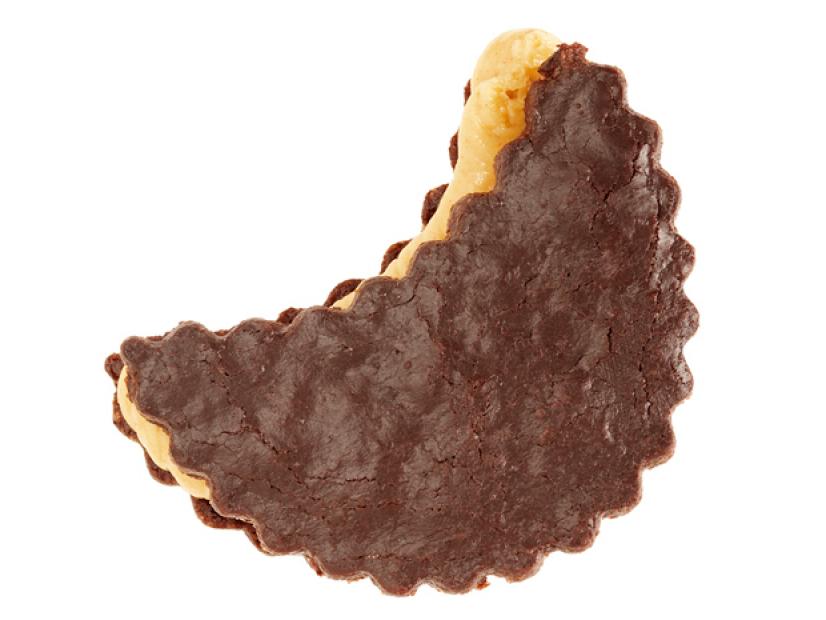 A sandwiched cookie shaped like a half moon