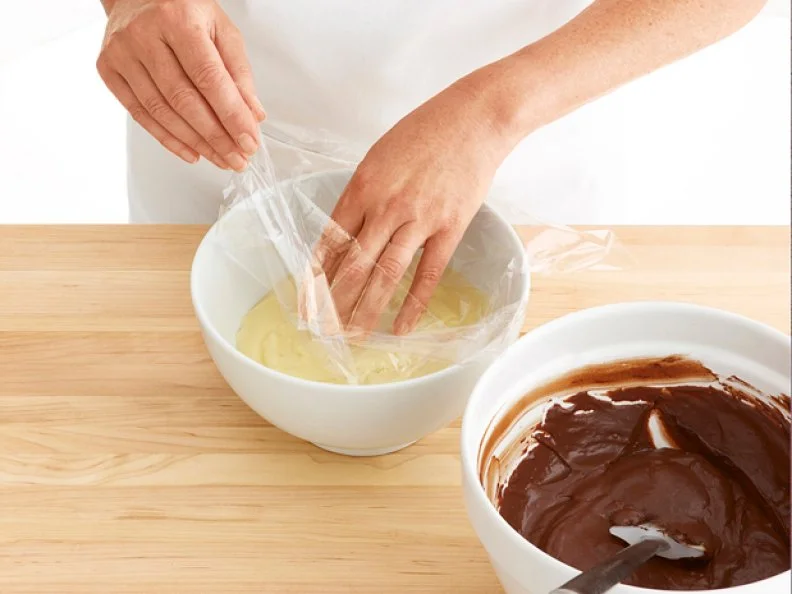Two Bowls With Ingredients to Make a Pastry Creme