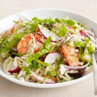Shrimp Orzo Topped with Greens, Herbs, Red Onions and Beets in a White Bowl