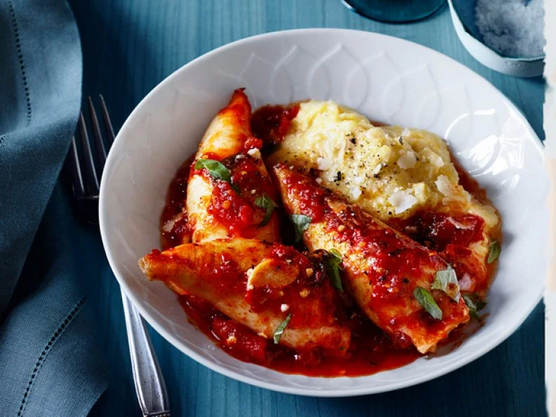 Italian XMas Eve Main An Italian Christmas Eve Entree with tomato sauce in a white bowl