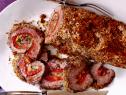 A encrusted meat rolled with vegetables as an entree used for a frugal weekend dinner